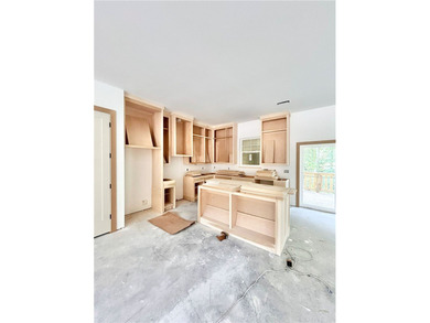Stunning new construction home on a beautiful wooded lot! Just - photo 21