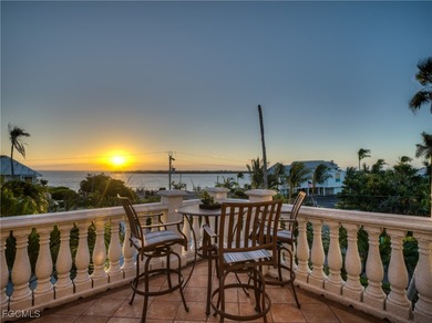 Experience the timeless coastal allure of 15160 Captiva Drive, a - photo 4