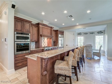 Experience the timeless coastal allure of 15160 Captiva Drive, a - photo 9