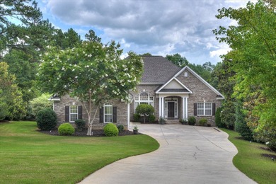 Located in the highly sought-after gated community of The - photo 1