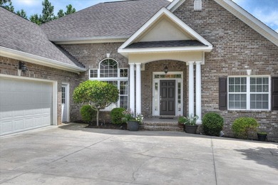 Located in the highly sought-after gated community of The - photo 2