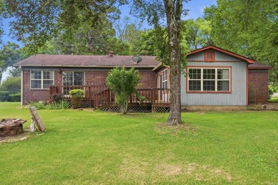 Check out Lake Hamilton's newest listing! This 3 Bed 2 Bath home - photo 3