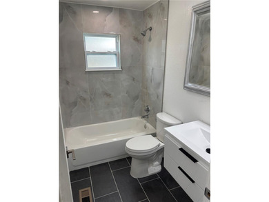 Welcome to a beautifully newly remodeled home with clean modern - photo 4