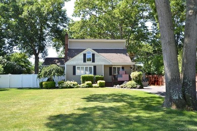 Welcome to this spacious 4-bedroom, 3-bath expanded ranch - photo 1