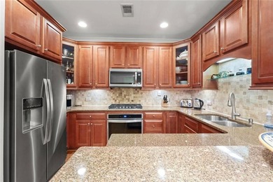 Welcome to this one-of-a-kind 3-bed, 2-bath condo in a