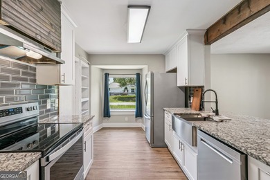 Discover this beautifully updated 3 bedroom, 2 bathroom home - photo 11
