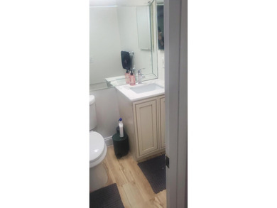Nicely renovated 1st floor 1 Bedroom, 1.5 Baths condo located in - photo 10