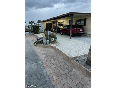 Located at Bayside Estates, a 55+ Community. This 1406 sq. ft - photo 2