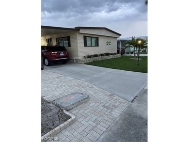 Located at Bayside Estates, a 55+ Community. This 1406 sq. ft - photo 3