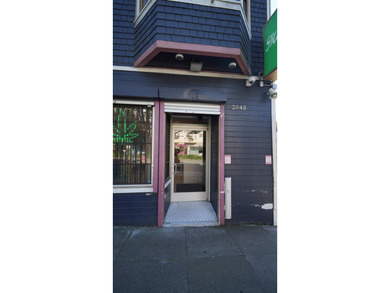 We are pleased to present this two-unit mixed-use income - photo 3