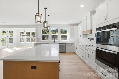 Step into a home that truly has it all, perfectly nestled in the - photo 22