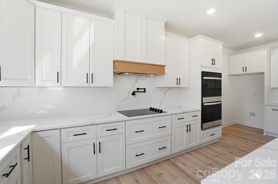 Step into a home that truly has it all, perfectly nestled in the - photo 24