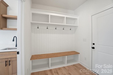Step into a home that truly has it all, perfectly nestled in the - photo 29