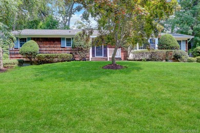 Welcome to this beautifully maintained cedar and brick-sided - photo 3