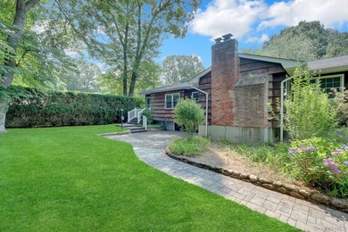 Welcome to this beautifully maintained cedar and brick-sided - photo 5