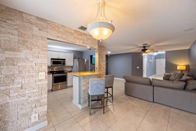 Beautifully updated townhome in the gated community of Discover - photo 1