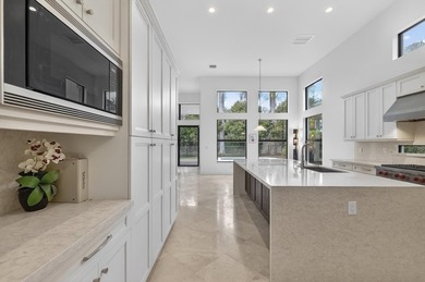 This exceptional, almost-new two-story Toll Brothers estate is - photo 12