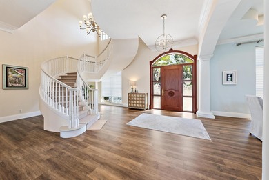 Discover this magnificent custom estate on the Loxahatchee River