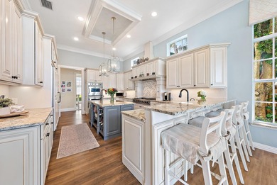 Discover this magnificent custom estate on the Loxahatchee River