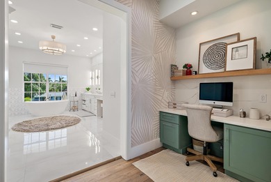 Discover this magnificent custom estate on the Loxahatchee River