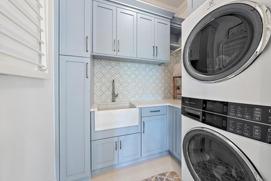 Discover this magnificent custom estate on the Loxahatchee River