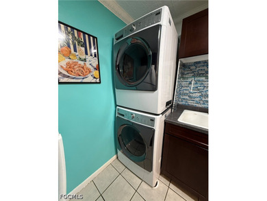 This lovely second-floor condo offers ultimate peace of mind - photo 10