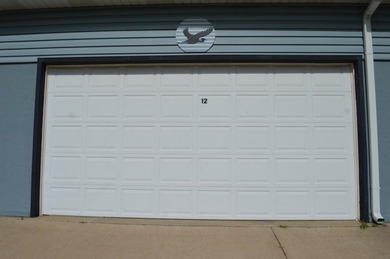Don't miss out on this beautiful condo with a 2 car garage and a - photo 7