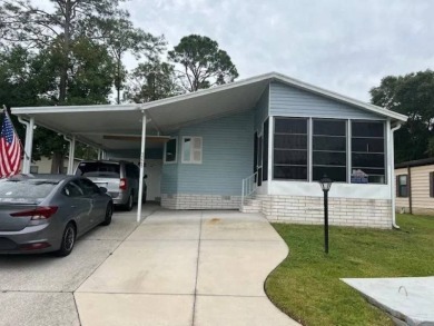 Lake Home For Sale in Spring Hill, Florida