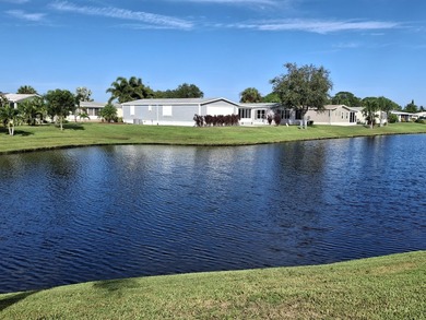 RARE THREE bedroom two bath home on the water. ROOF ( 2021), AC - photo 1