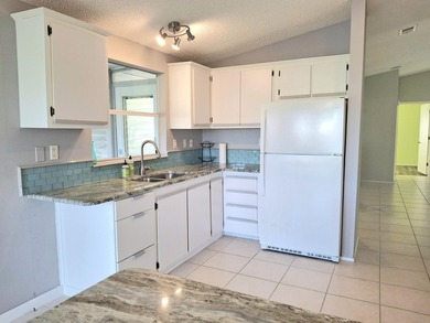 RARE THREE bedroom two bath home on the water. ROOF ( 2021), AC - photo 7