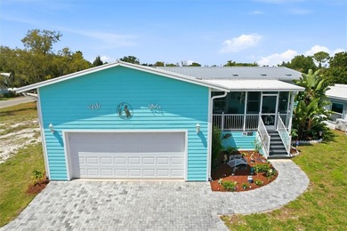 Nestled within the exclusive gated, waterfront community of - photo 3