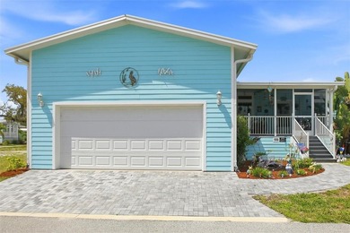 Nestled within the exclusive gated, waterfront community of - photo 5