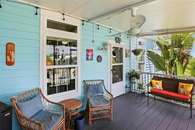 Nestled within the exclusive gated, waterfront community of - photo 8