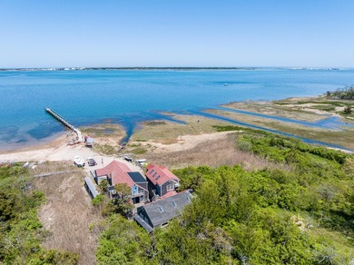 Set along the shores of Barnstable Harbor at the end of a - photo 11
