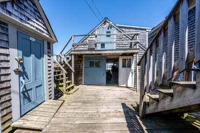 Set along the shores of Barnstable Harbor at the end of a - photo 25