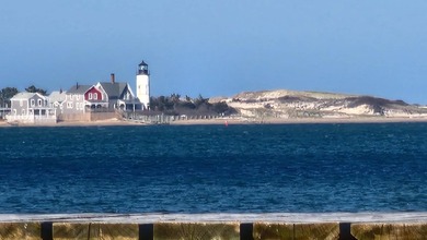 Set along the shores of Barnstable Harbor at the end of a - photo 31
