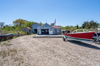 Set along the shores of Barnstable Harbor at the end of a - photo 49