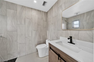 Beautifully RENOVATED 3-bedroom, 2-bath home located on an - photo 4