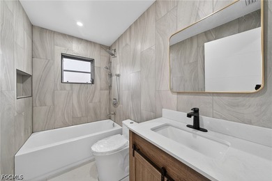 Beautifully RENOVATED 3-bedroom, 2-bath home located on an - photo 5