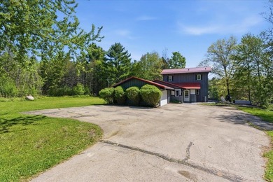 Tucked among towering trees on 2.5 wooded acres at the end of a - photo 2