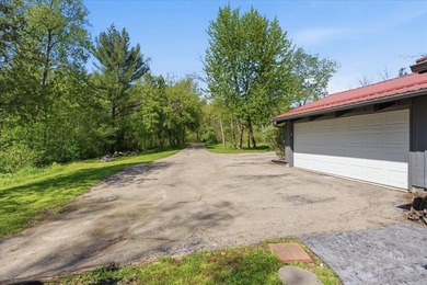 Tucked among towering trees on 2.5 wooded acres at the end of a - photo 6
