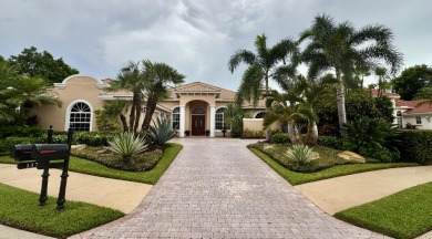 Lake Home For Sale in Palm Beach Gardens, Florida