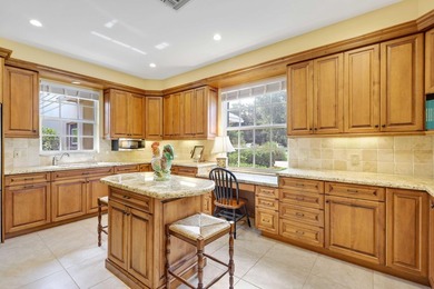 Set on a generous .88-acre lot overlooking the 8th tee, this - photo 21