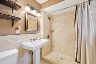 Set on a generous .88-acre lot overlooking the 8th tee, this - photo 31