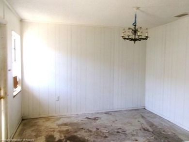 On the affordable side for a home. This is a block home with 3 - photo 4