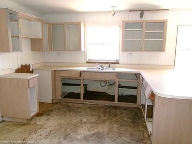 On the affordable side for a home. This is a block home with 3 - photo 5