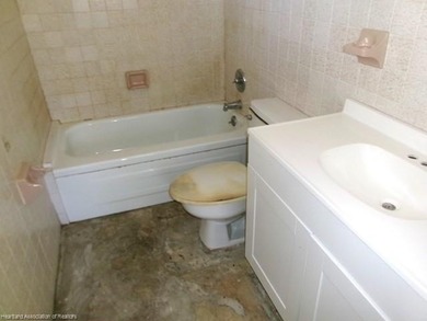 On the affordable side for a home. This is a block home with 3 - photo 9