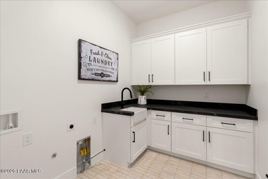 **JUST COMPLETED!** Experience luxury golf course living in the - photo 15