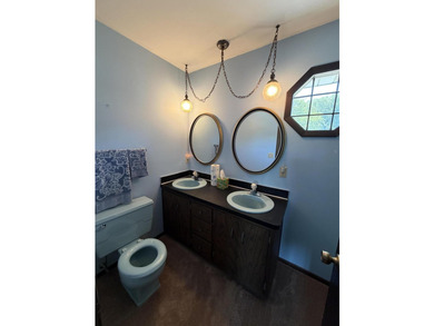 Opportunity awaits with this spacious two-story lakefront home - photo 21