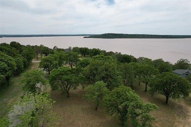 Enjoy vast lake views from your front porch when building on lot - photo 2